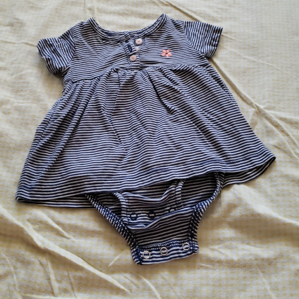Dress with button closure